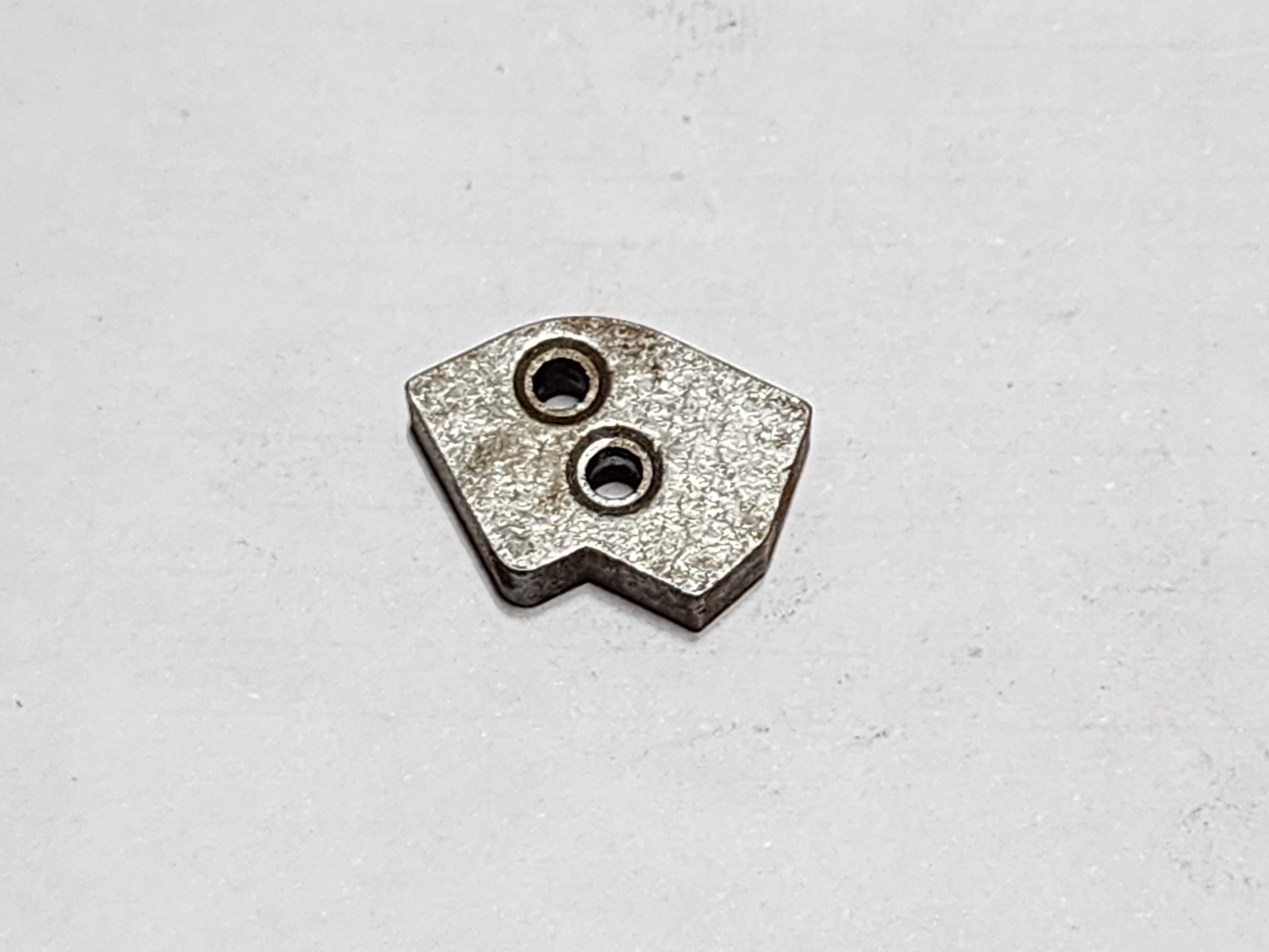 REM 700 XMP EA TRIGGER HOUSING SPACER REAR – REV R